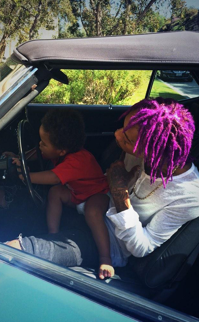 Wiz Khalifa Sporting Purple Rain Hair And Amber Rose